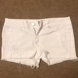 White distressed shorts